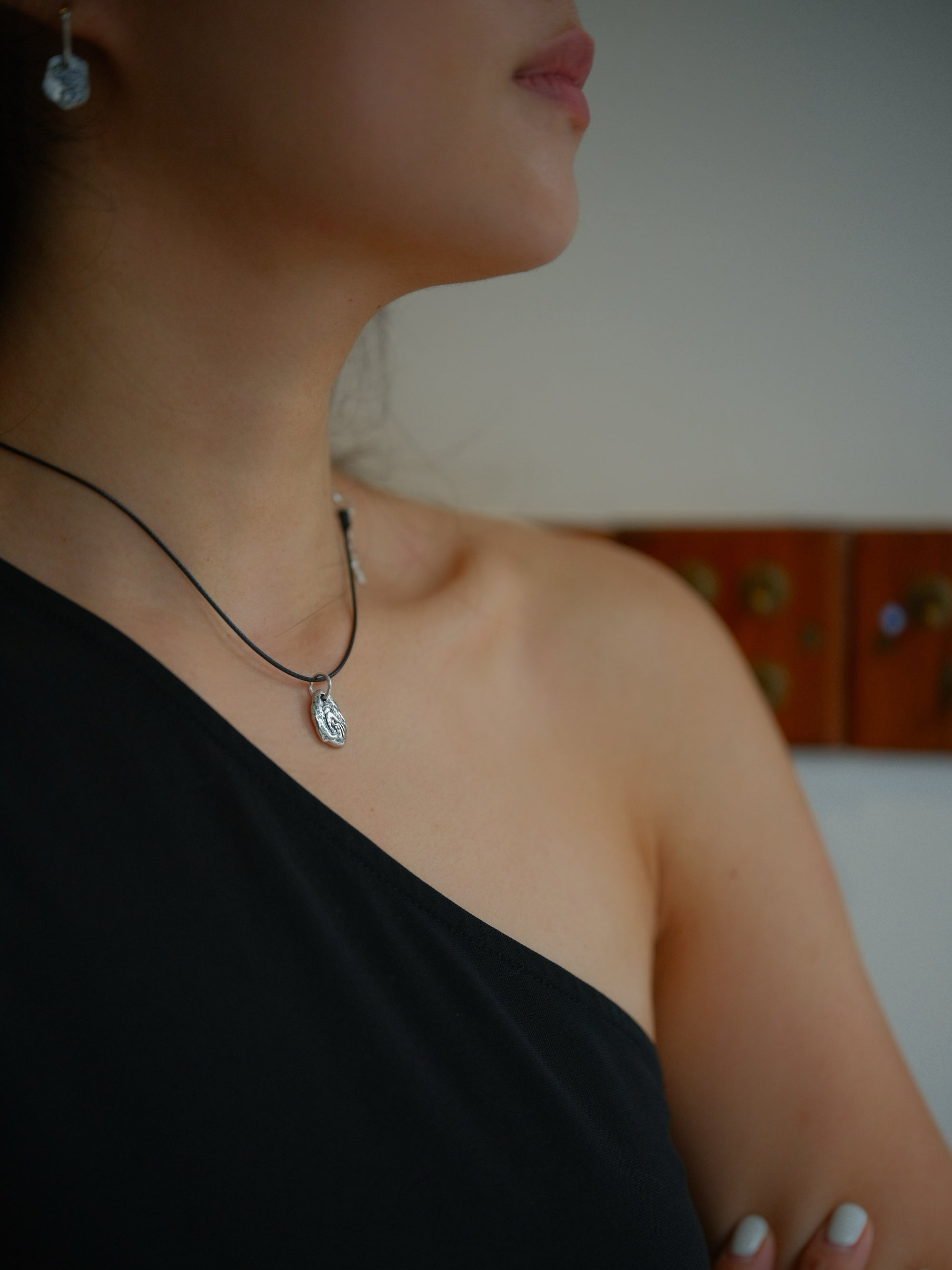 Tara Hand Mudra Necklace (Leather Chain)